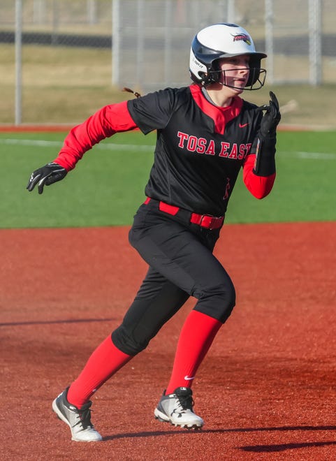 Wauwatosa East's Ella Welcenbach (1) speeds around the bases during the game at Wauwatosa West, Thursday, March 21, 2024. Wauwatosa East won 14-4.